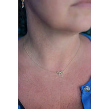 Diamond Accent Bow Pendant Necklace