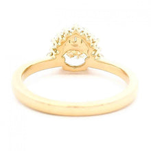 Oval Diamond Ring With Half Baguette Diamond Halo