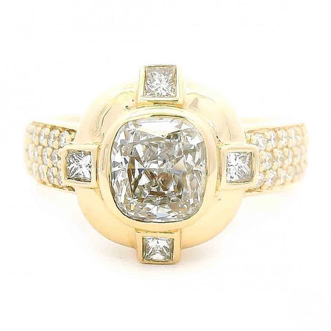 Cushion Diamond Ring With Princess Diamond Accents and Pave Shank