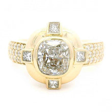 Cushion Diamond Ring With Princess Diamond Accents and Pave Shank